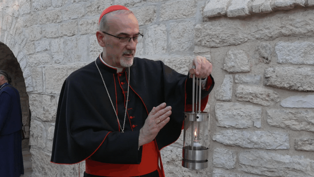 Cardinale Pierbattista Pizzaballa, patriarca latino di Gerusalemme benedice la Luce della Pace. Credits: friedenslicht.orf.at